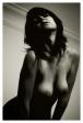 nude woman exposing breasts